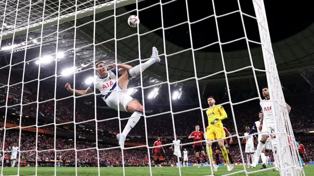 Micky van de Ven clearance off the line