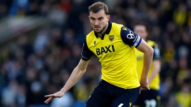 Michal Helik in action for Oxford United