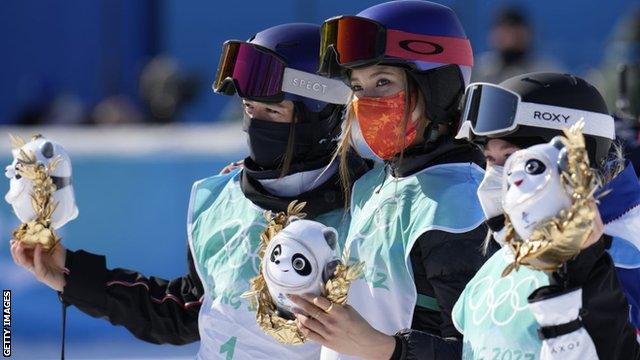 Mathilde Gremaud (left), Eileen Gu (centre) and Tess Ledeux (right)