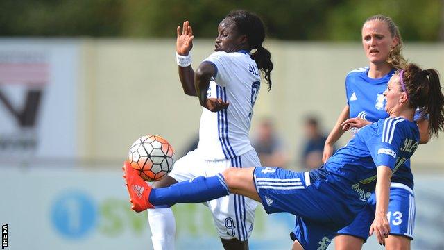 Eni Aluko (left) tries to break away from