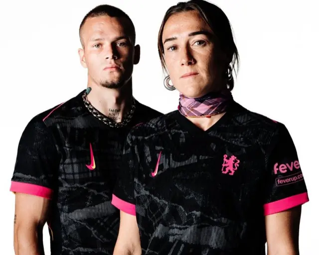 Mykhailo Mudryk and Lucy Bronze pose in new Chelsea third kit with black patterned shirt pink detailing