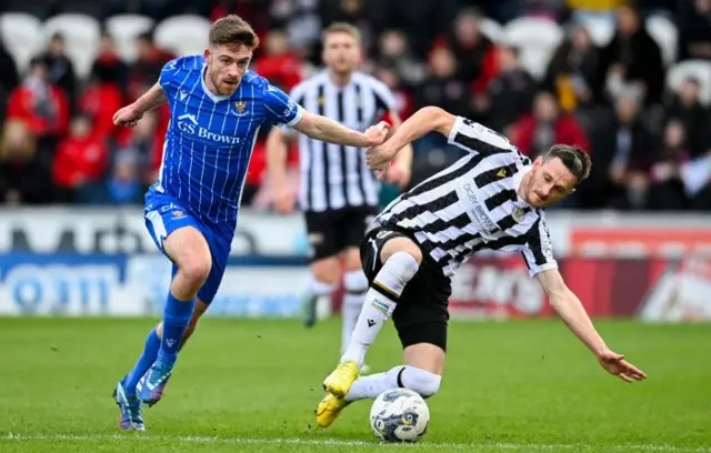 St Mirren's Scott Tanser (R) and St Johnstone's Tony Gallacher in action during a cinch Premiership match between St Mirren and St Johnstone at the SMiSA Stadium, on February 24, 2024, in Paisley, Scotland.