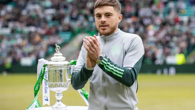 Celtic winger James Forrest with the Scottish Cup