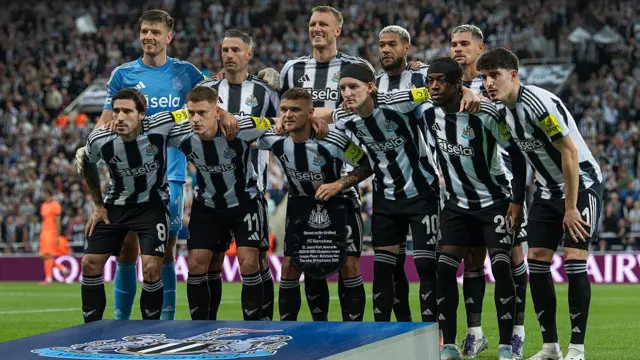 Newcastle players together before the Barcelona Champions League game