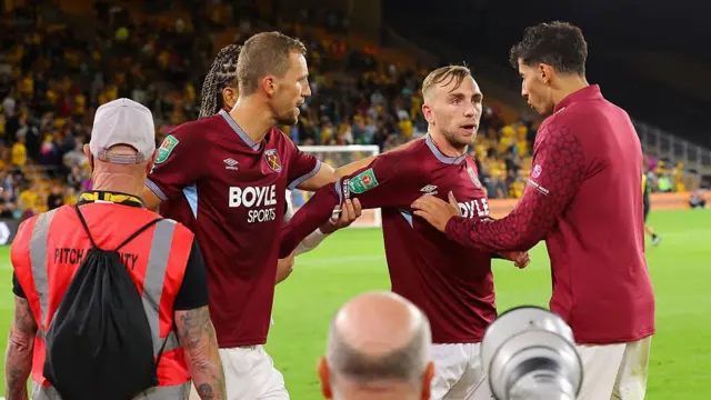 Bowen being held back by his team-mates after loss to Wolves