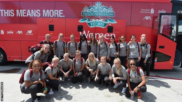 Liverpool Women in front of their official team bus