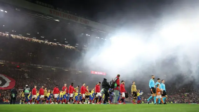 A general view as players of Manchester United and Real Sociedad walk out onto the pitch at Old Trafford