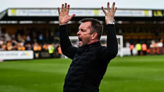 Charlton boss Nathan Jones celebrates