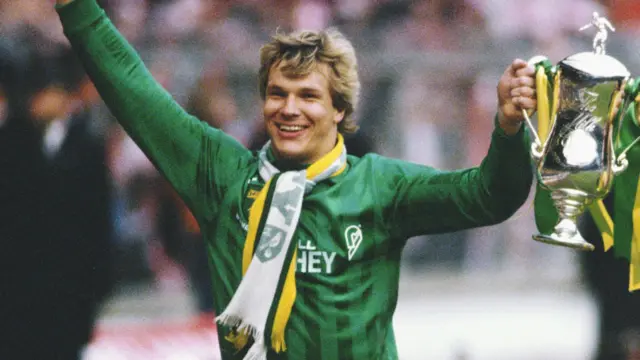 Norwich City goalkeeper Chris Woods celebrates and holds the League Cup trophy aloft after beating Sunderland 1-0 at Wembley on 24 March, 1985