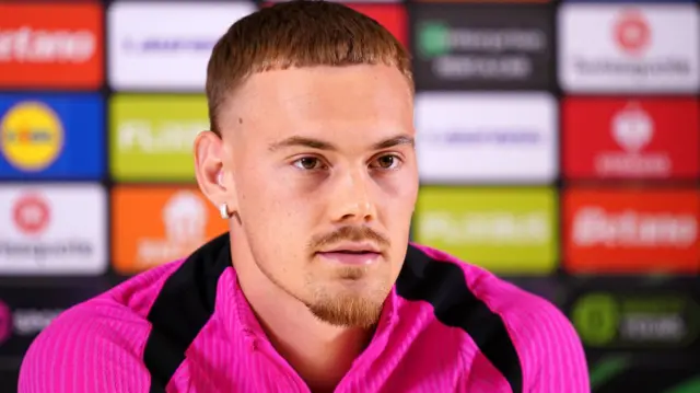 Filip Jorgensen speaks at a news conference