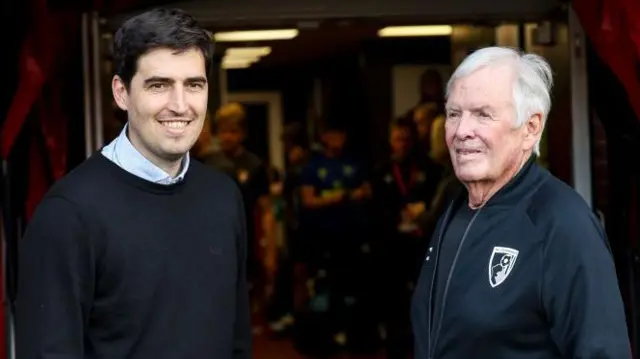 Bournemouth head coach Andoni Iraola chats with club owner and chairman Bill Foley