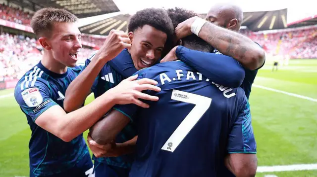 Leicester players celebrate with goalscorer Abdul Fatawu at The Valley