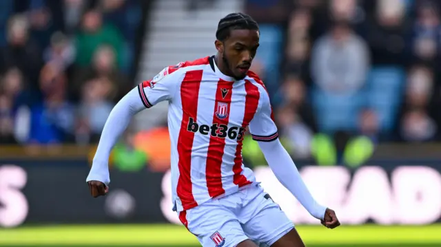 Stoke's Eric Bocat in action passing the ball