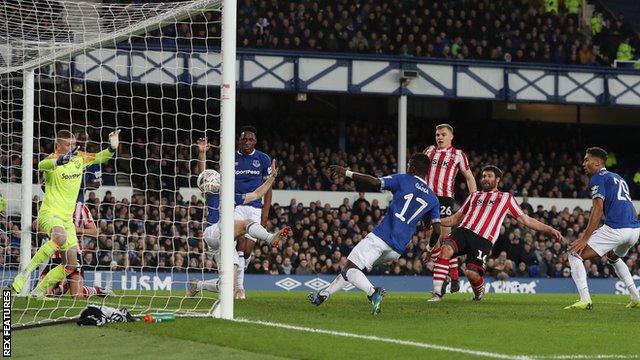 Michael Bostwick scores for Lincoln City against Everton