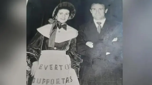 Everton FC toffee lady Mary Morgan with Blues player Tommy Eglington