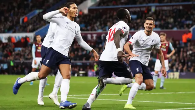 Sadio Mane runs towards the Liverpool supporters after scoring a last-gasp winner for Liverpool at Aston Villa in November 2019