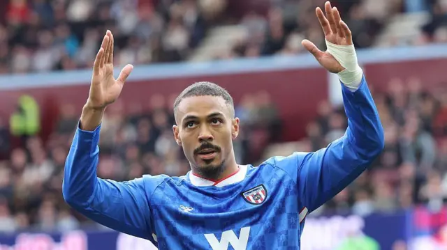 Wilson Isidor of Sunderland celebrates after he scores the third