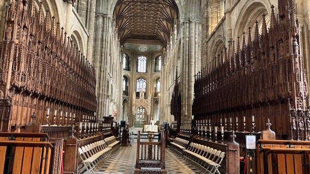 Altar at the Cathedral with choir stalls visible at either side