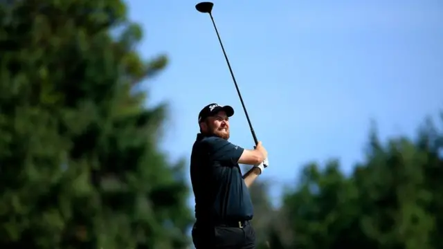 Shane Lowry hits a tee shot