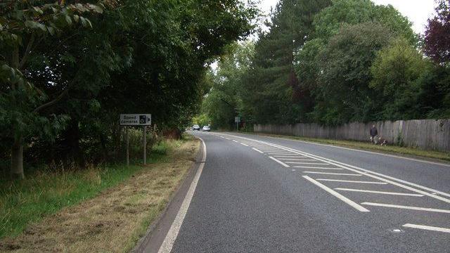 A65 near Gargrave showing double white lines and a bend in the road