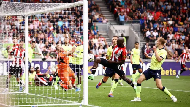 Yoane Wissa of Brentford scores his team's third goal