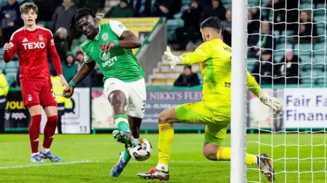 Rocky Bushiri scores against Aberdeen