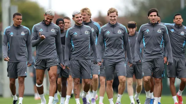 Newcastle United players look smiley during a training session 