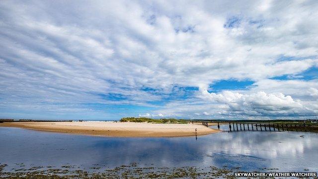 Clouds over a beach