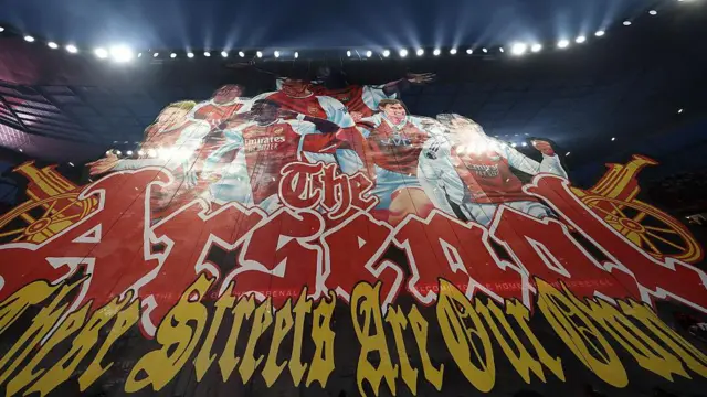 Arsenal tifo reads 'these streets are our own'