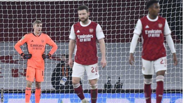 Arsenal's players reacts after conceding in the 4-1 defeat to Manchester City in the Carabao Cup