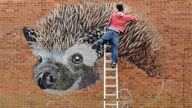 The hedgehog mural in progress. Artist Louis Masai, SAW and Somerset Wildlife Trust - Routes to the River Tone.