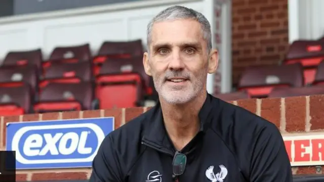 Stuart Watkiss in the stands at Aggborough