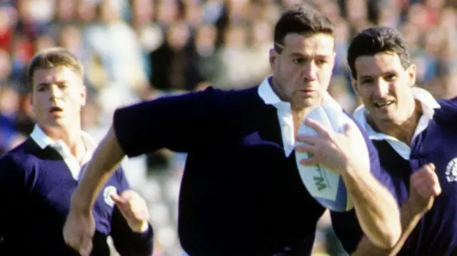 Scott Hastings carries the ball for Scotland