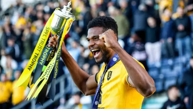Michael Nottingham with the Scottish Premiership Play-off trophy