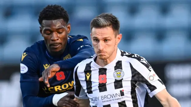 Dundee's Amadou Bakayoko and St Mirren's Scott Tanser