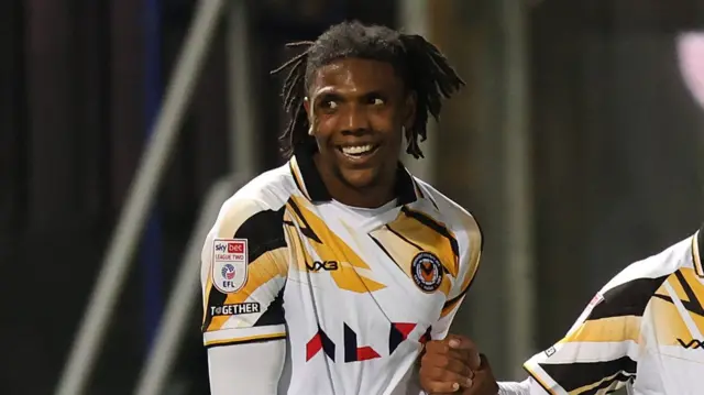 Newport County striker Kyle Hudlin celebrates