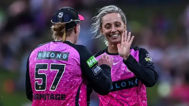 Ash Gardner of Sydney Sixers celebrates a wicket