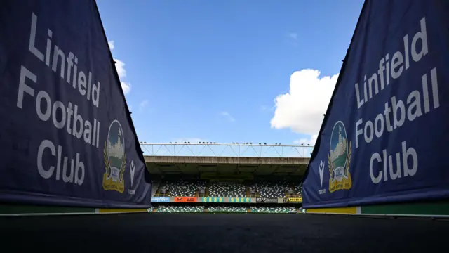 A view of two Linfield crests at Windsor Park