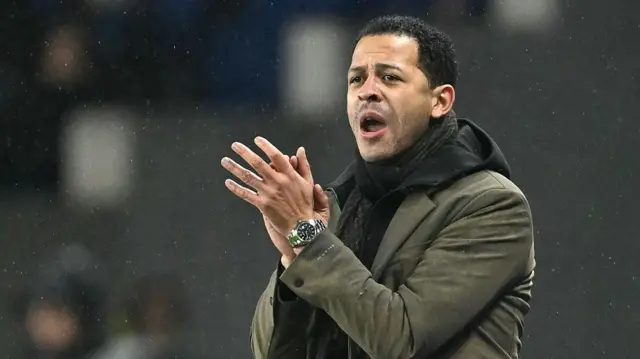 Liam Rosenior shouts from the touchline while clapping his hands together