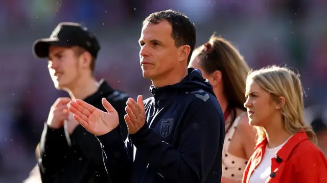 Regis le Bris applauding