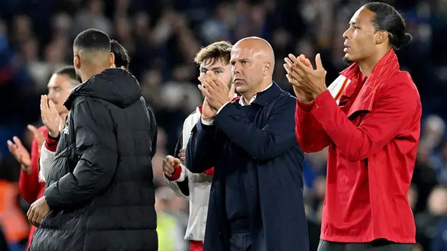 Slot and his players after the defeat to Brighton