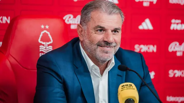 Ange Postecoglou in front of a yellow BBC Sport microphone