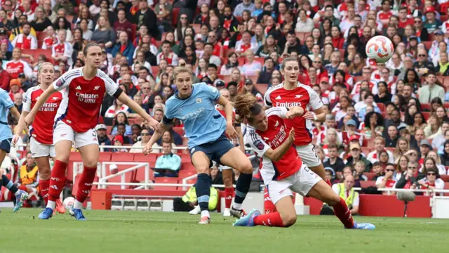 Manchester City striker Vivianne Miedema scores against Arsenal