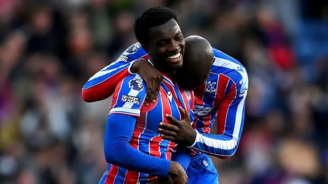 Eddie Nketiah celebrates scoring his team's second goal with teammate Jean-Philippe Mateta 