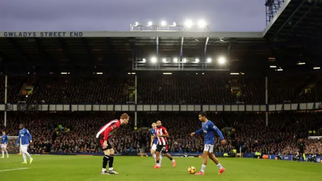 General view inside the stadium as Iliman Ndiaye of Everton is challenged by Sepp van den Berg of Brentford