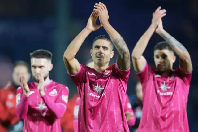 Swansea players applaud their fans after the draw at Birmingham