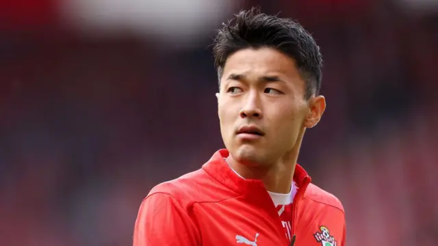 Yukinari Sugawara of Southampton looks on as he warms up prior to during the Premier League match between Southampton FC and Manchester United FC at St Mary's Stadium