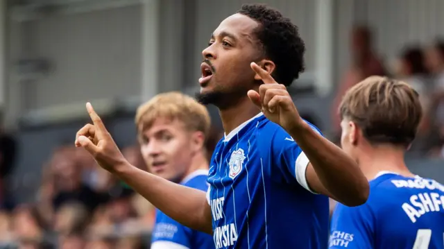 Chris Willock celebrates scoring for Cardiff at Luton Town