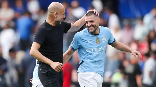 Pep Guardiola and Mateo Kovacic 