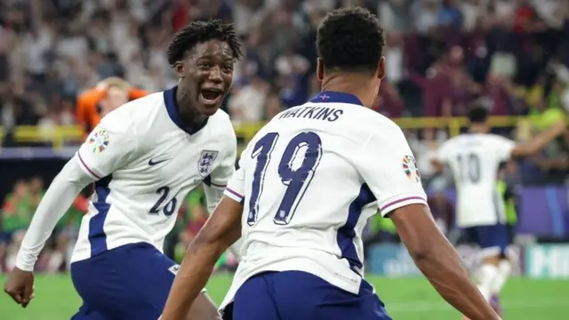 Kobbie Mainoo (left) celebrates with England team-mate Ollie Watkins